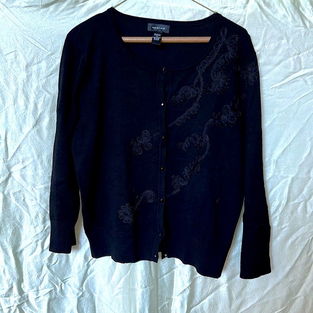 Black jacket with buttons and embroidery